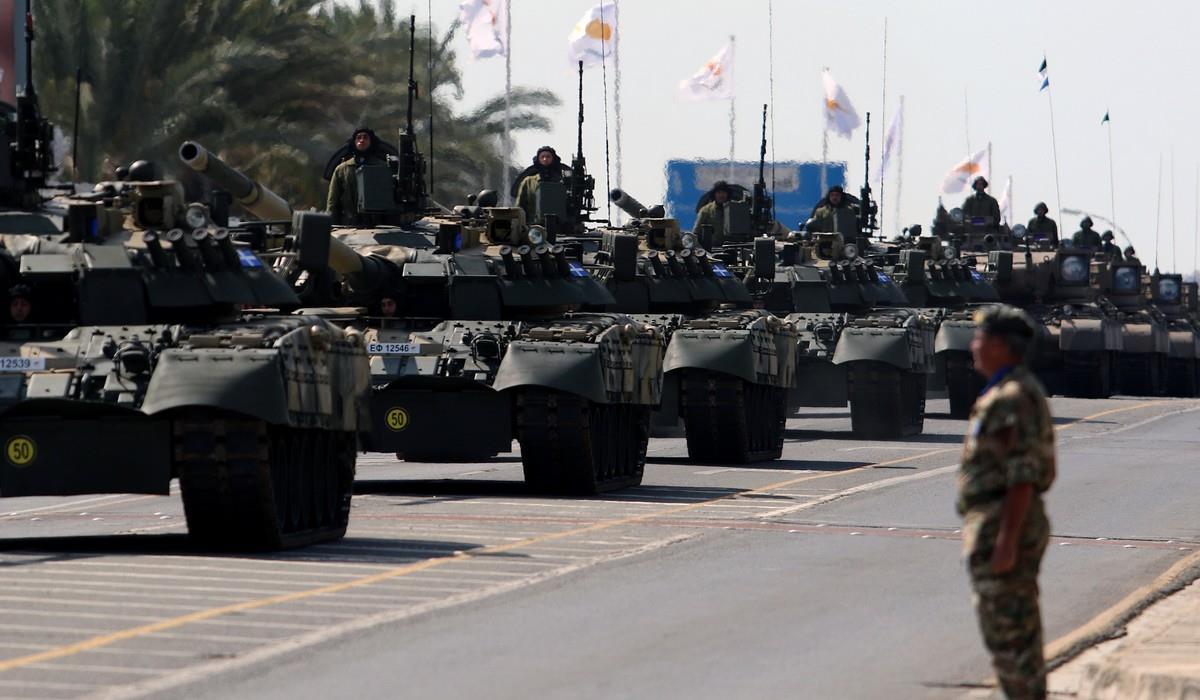Cypriot army armoured vehicles participate in a military parade marking Cyprus' Independence Day in Nicosia